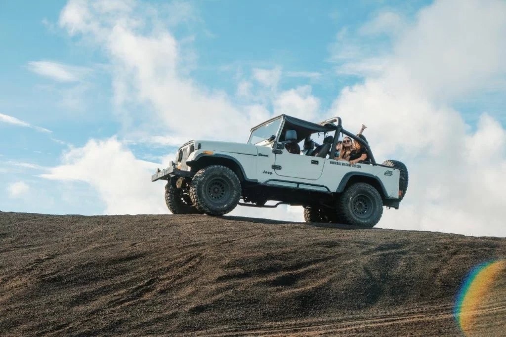 Jeep driving through Bali's dense forests